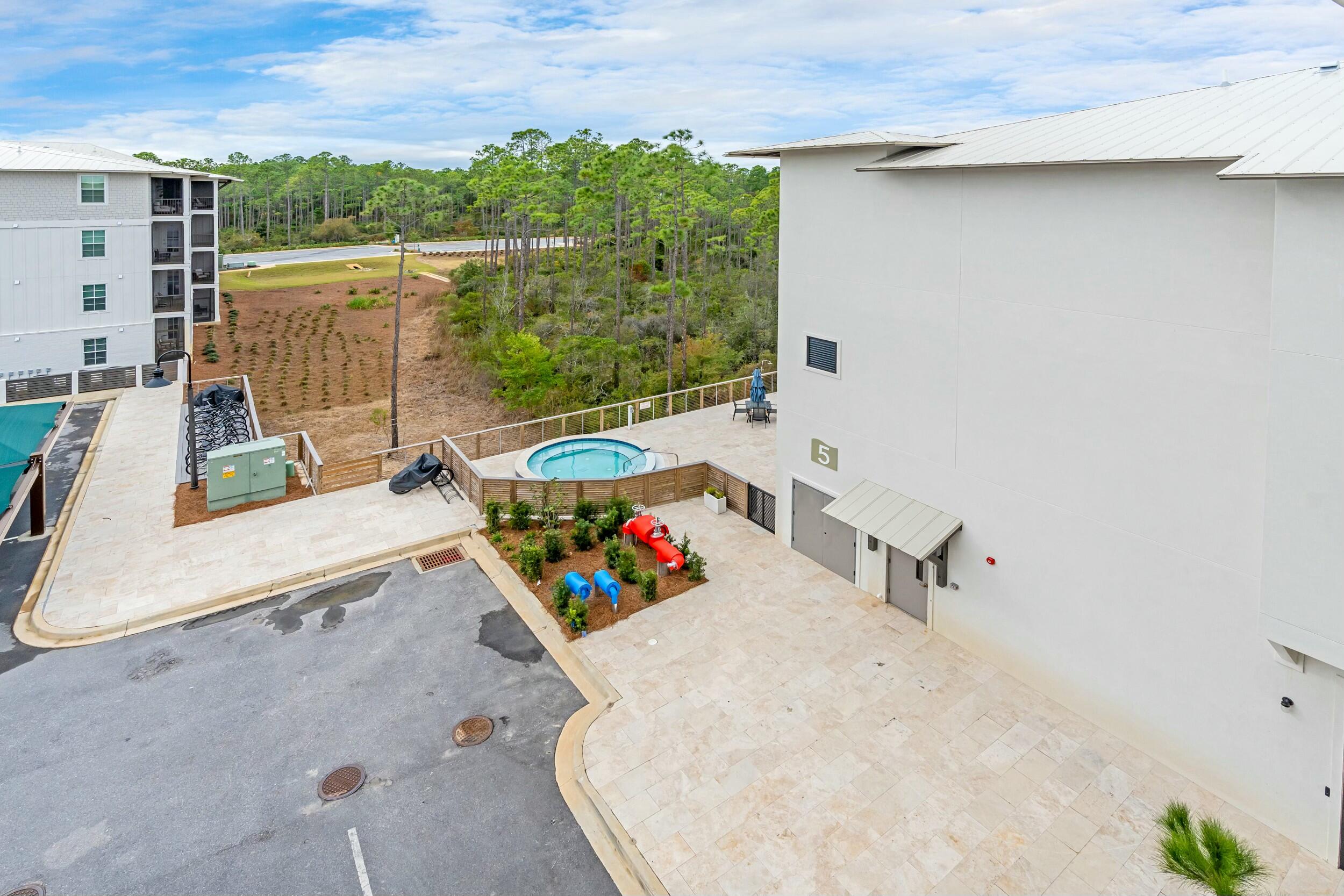 179 South County Highway 393, Unit 445 Santa Rosa Beach, FL 32459 - Photo 12 of 50 a view of outdoor space with seating area