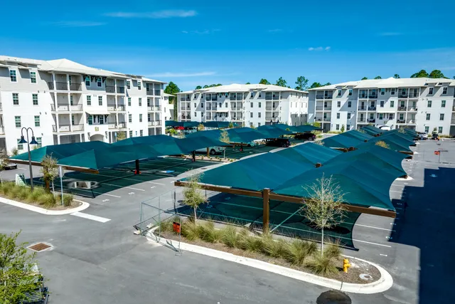 a view of a swimming pool with a patio