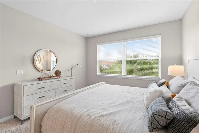 $480,000 | 9402 Pocida Court, Unit 202, Naples, FL 34119