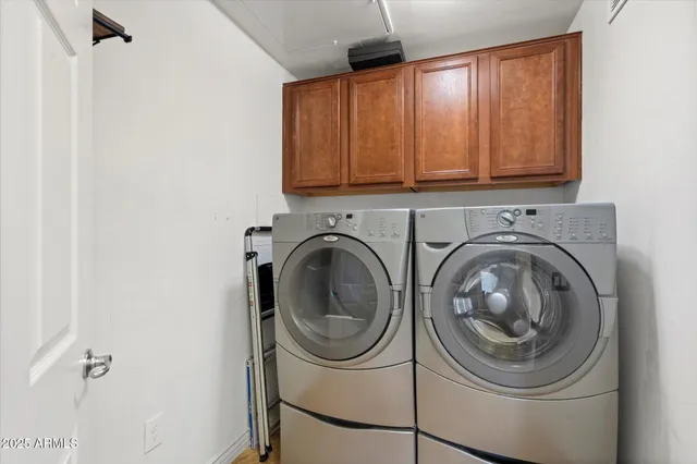 a utility room with dryer and washer