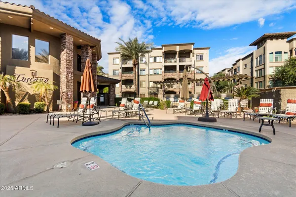 a outdoor space with lots of chairs and mirrors