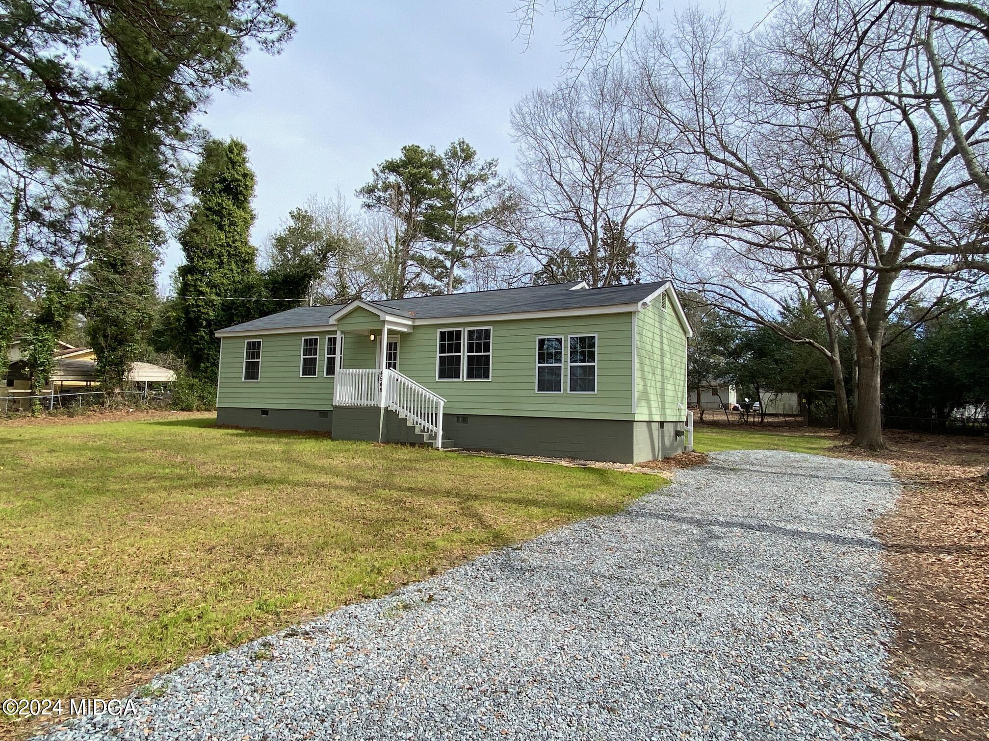4548 Massey Road Macon, GA 31206 - Photo 3 of 27 a view of a house with a yard