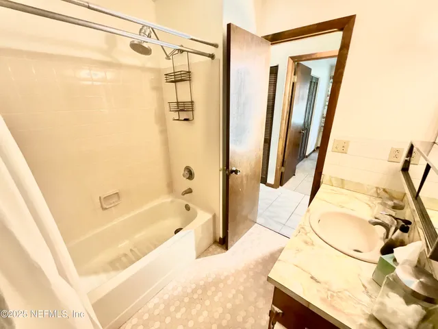 a view of a room with an outdoor seating