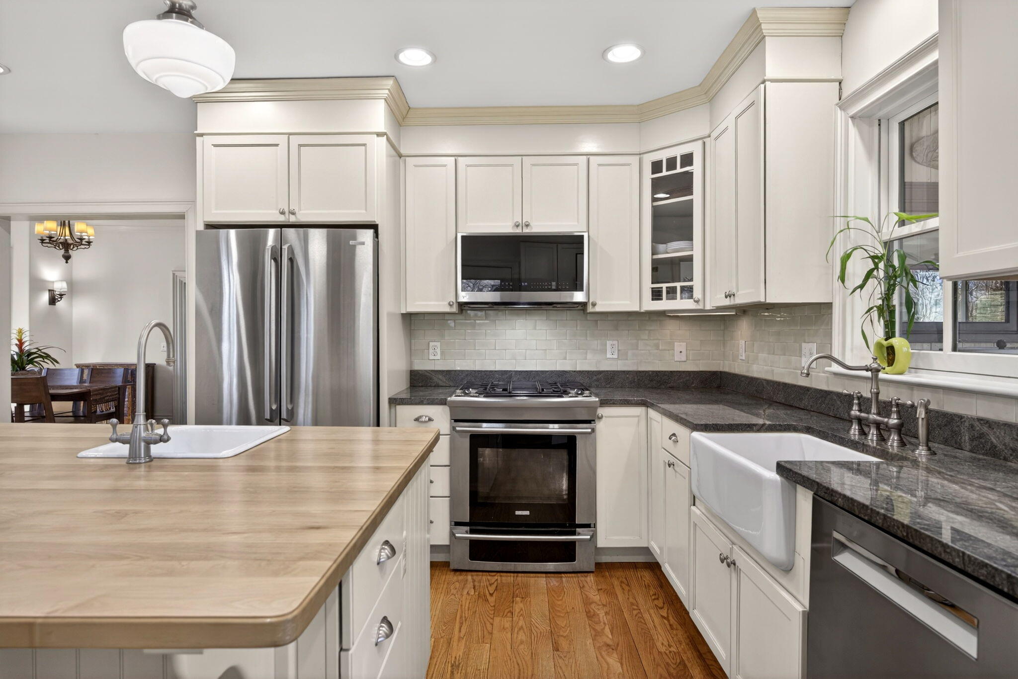 474 Davisville Road East Falmouth, MA 02536 - Photo 15 of 66 a kitchen with stainless steel appliances granite countertop a sink stove and refrigerator