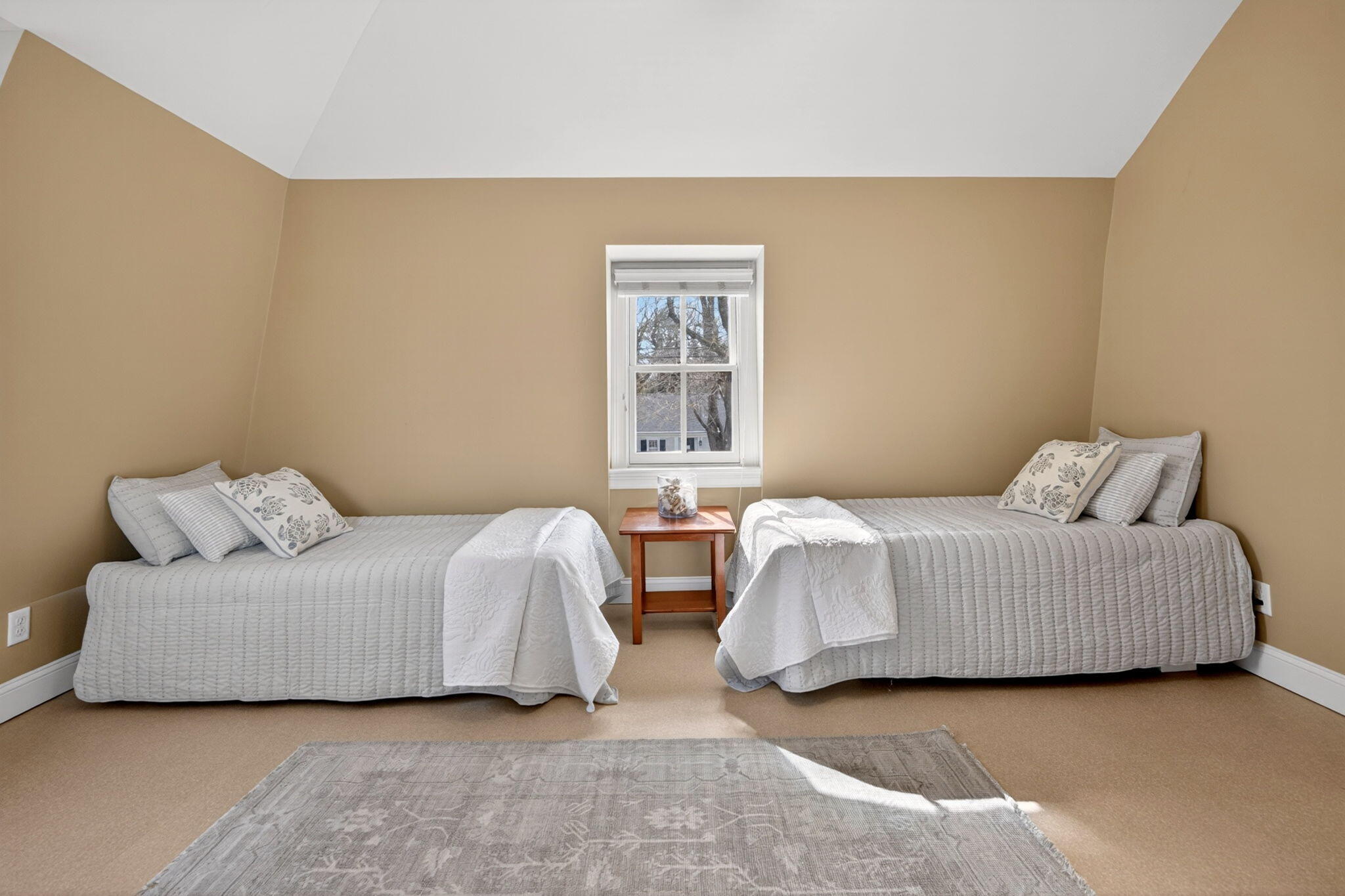 474 Davisville Road East Falmouth, MA 02536 - Photo 31 of 66 a bedroom with two beds and painting on the wall