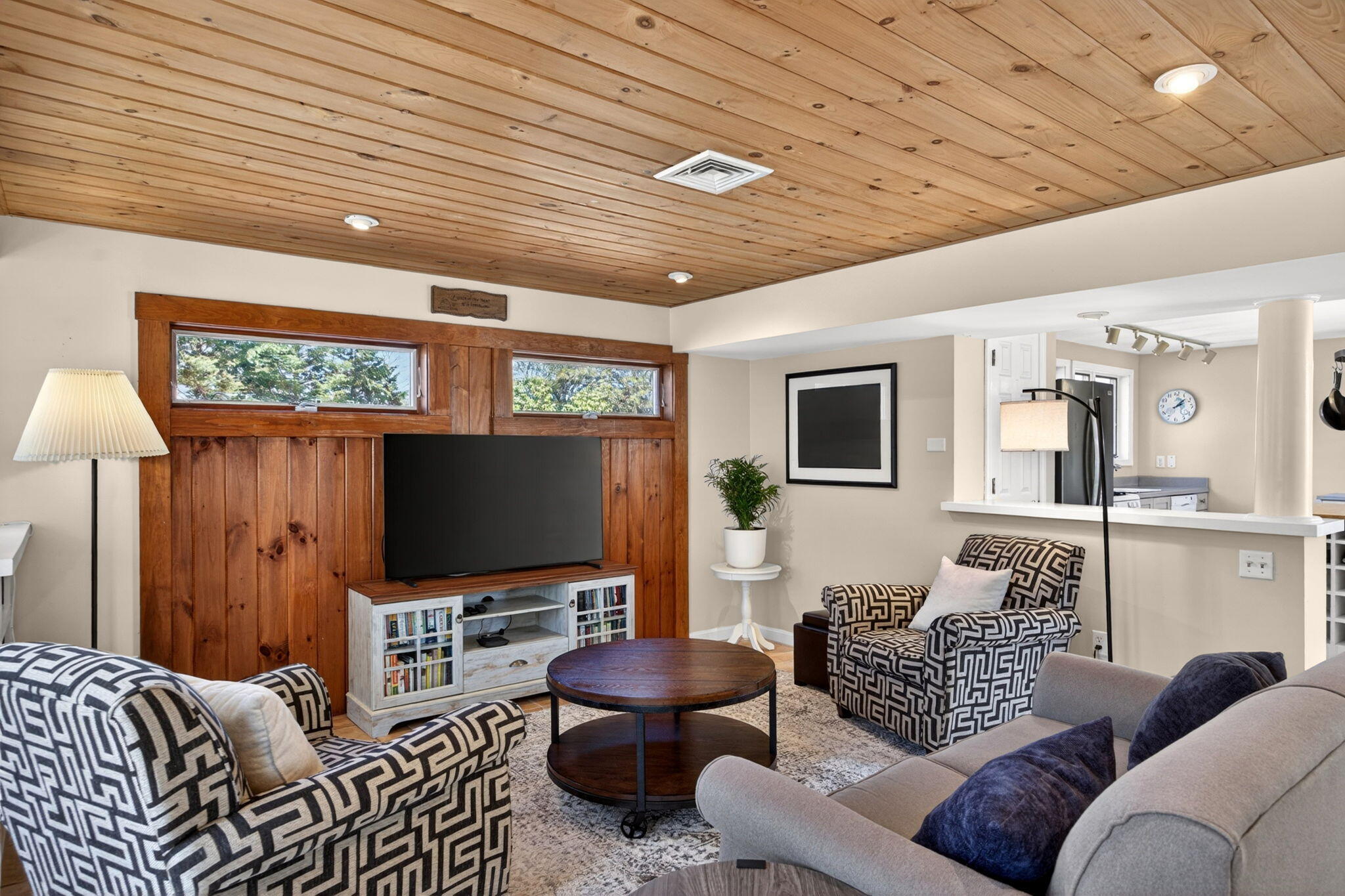 474 Davisville Road East Falmouth, MA 02536 - Photo 38 of 66 a living room with furniture and a flat screen tv