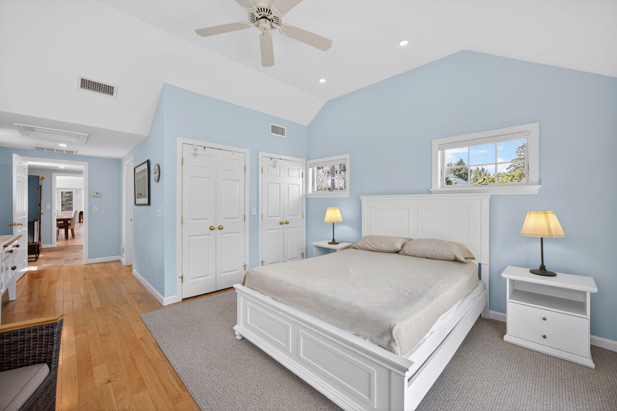 474 Davisville Road East Falmouth, MA 02536 - Photo 42 of 66 a bedroom with a bed and a chandelier