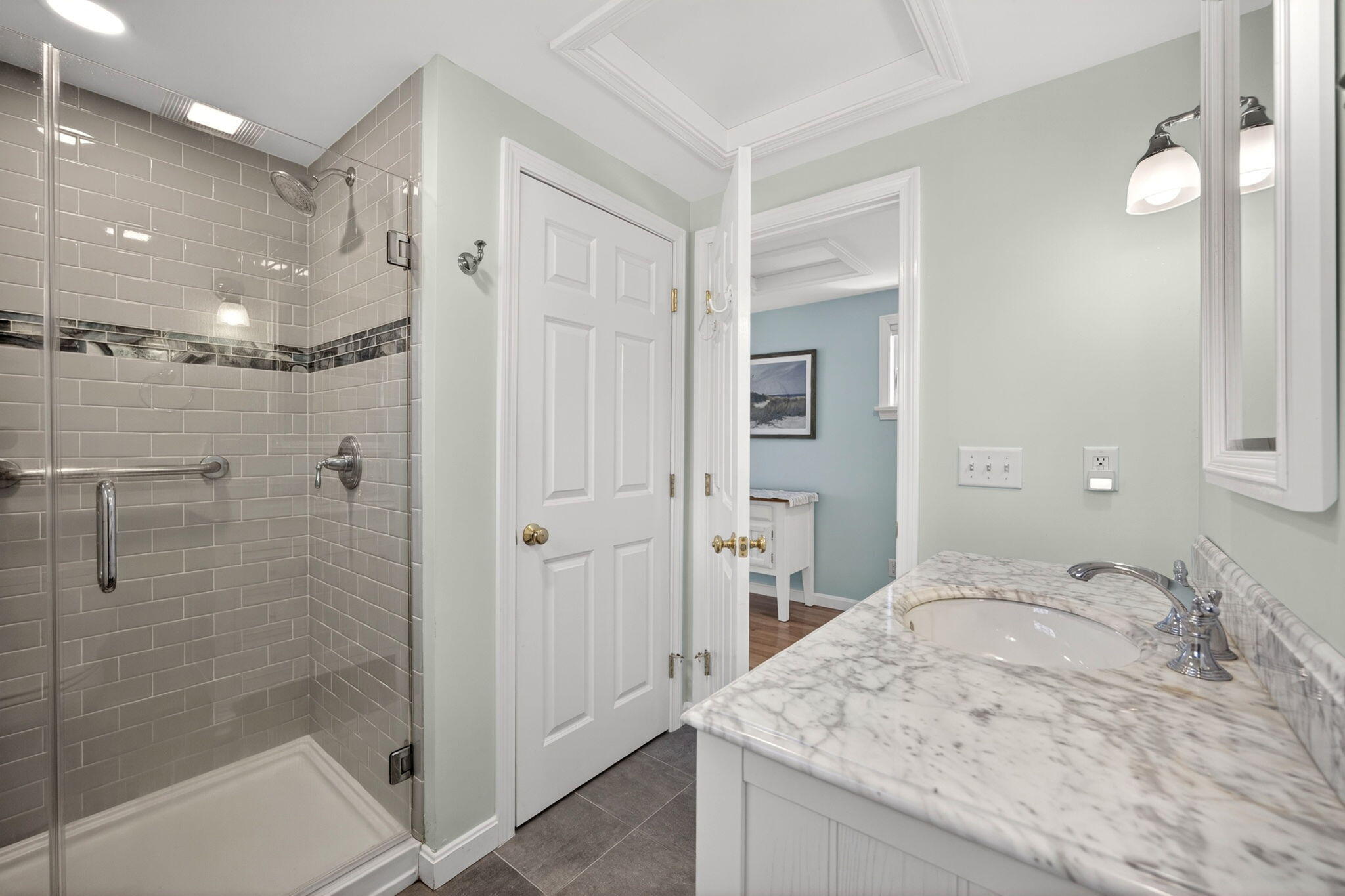 474 Davisville Road East Falmouth, MA 02536 - Photo 45 of 66 a bathroom with a granite countertop sink mirror and shower