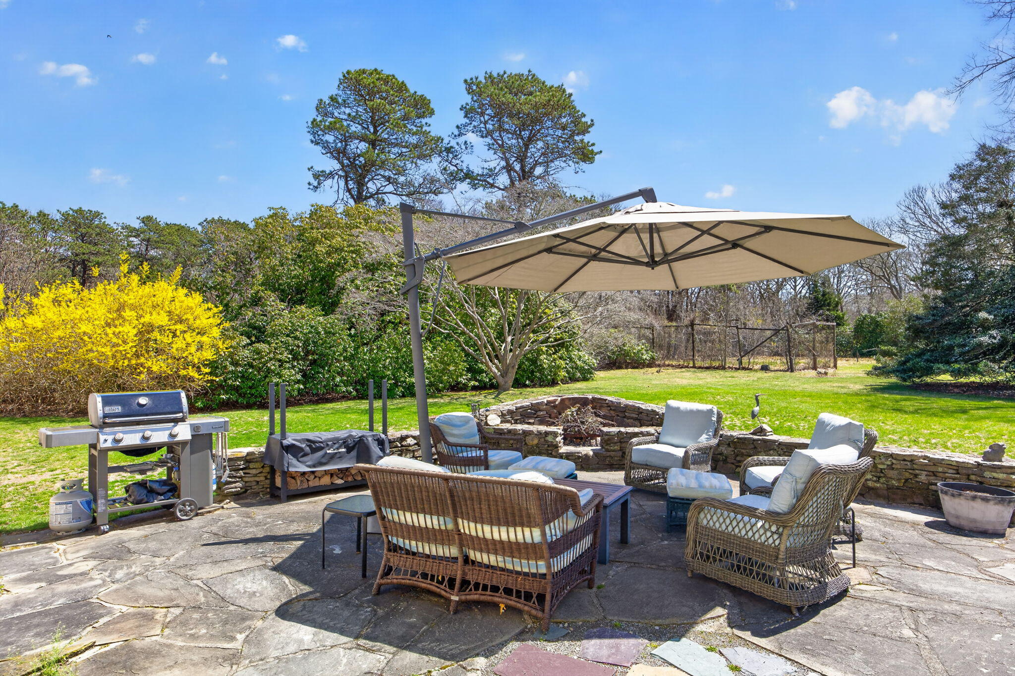 474 Davisville Road East Falmouth, MA 02536 - Photo 58 of 66 a view of a swimming pool with a couches in a patio
