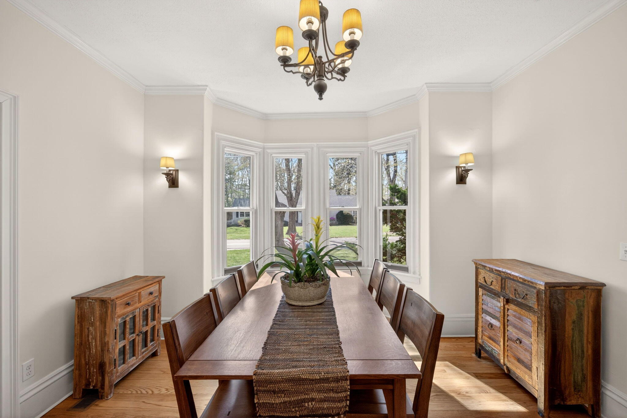 474 Davisville Road East Falmouth, MA 02536 - Photo 9 of 66 a view of a dining room with furniture window and wooden floor