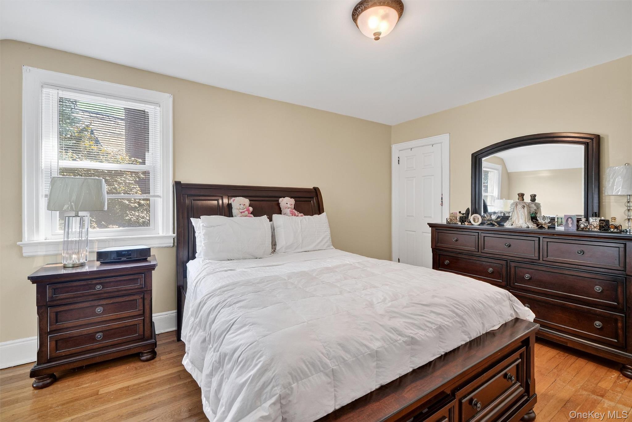 3384 Country Club Road Bronx, NY 10465 - Photo 30 of 48 Bedroom featuring light wood finished floors