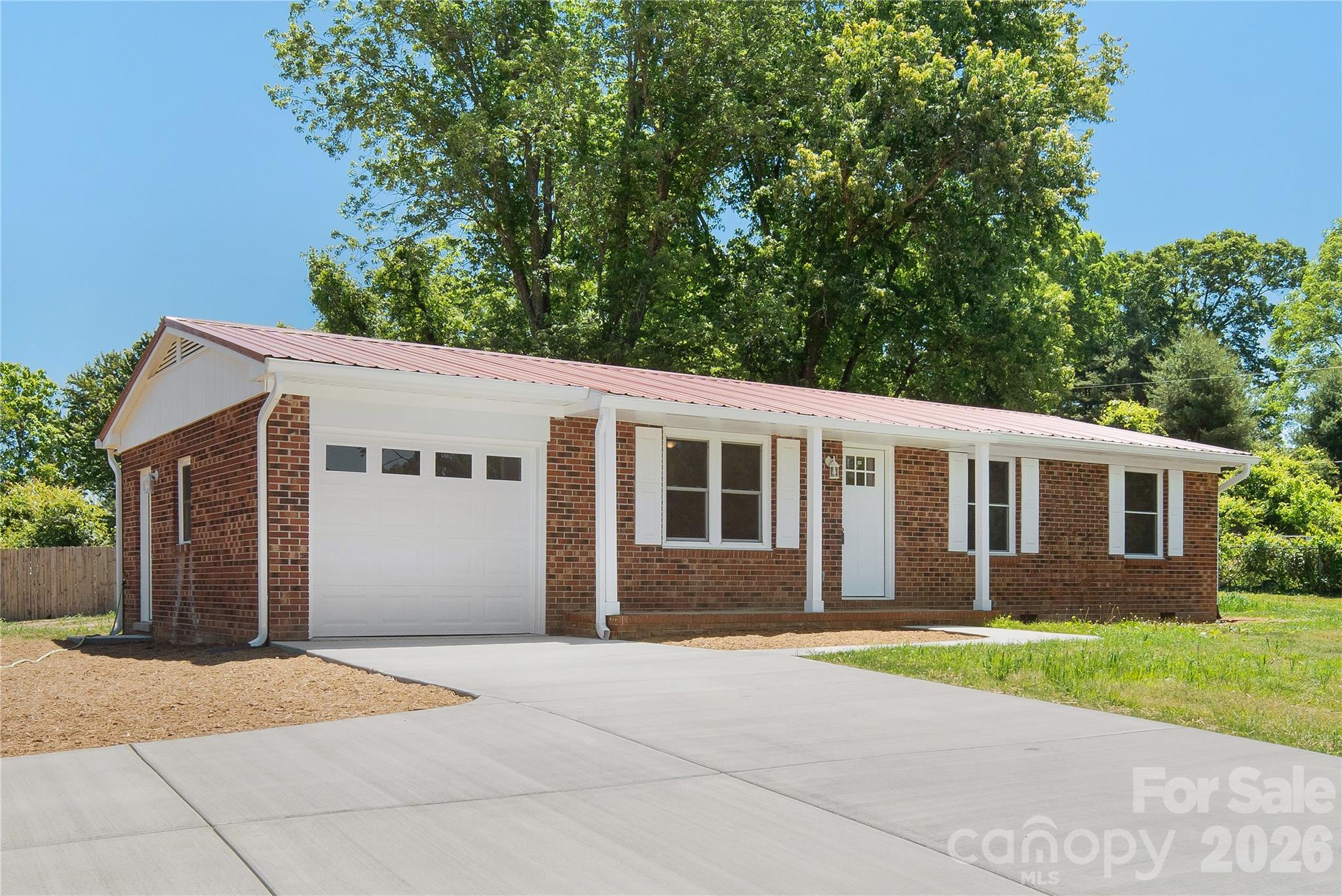 287 Duncan Road Flat Rock, NC 28731 - Photo 2 of 13 a house view with a garden space