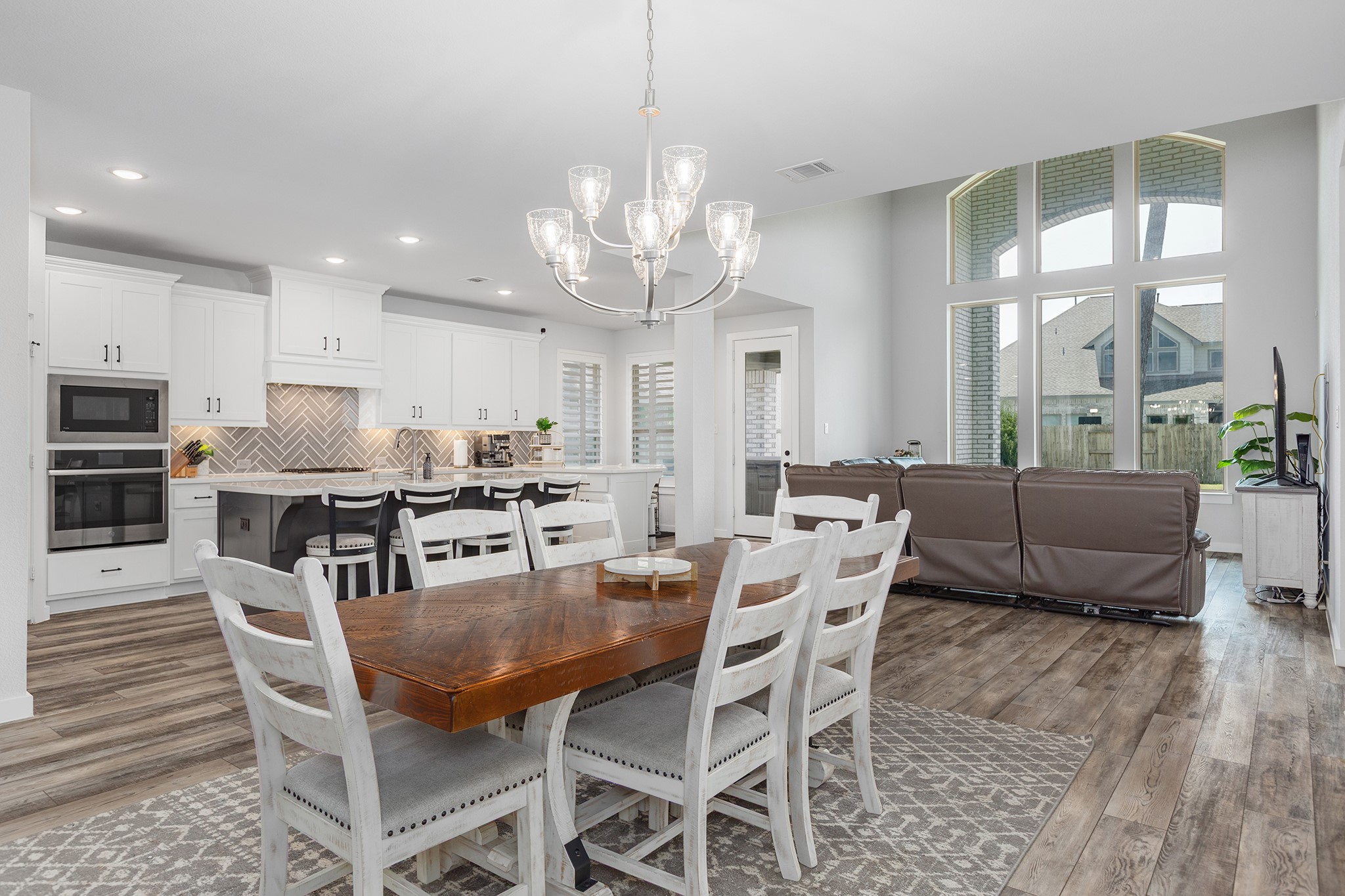 12110 Woodnote Lane Humble, TX 77346 - Photo 12 of 36 a view of a dining room with furniture