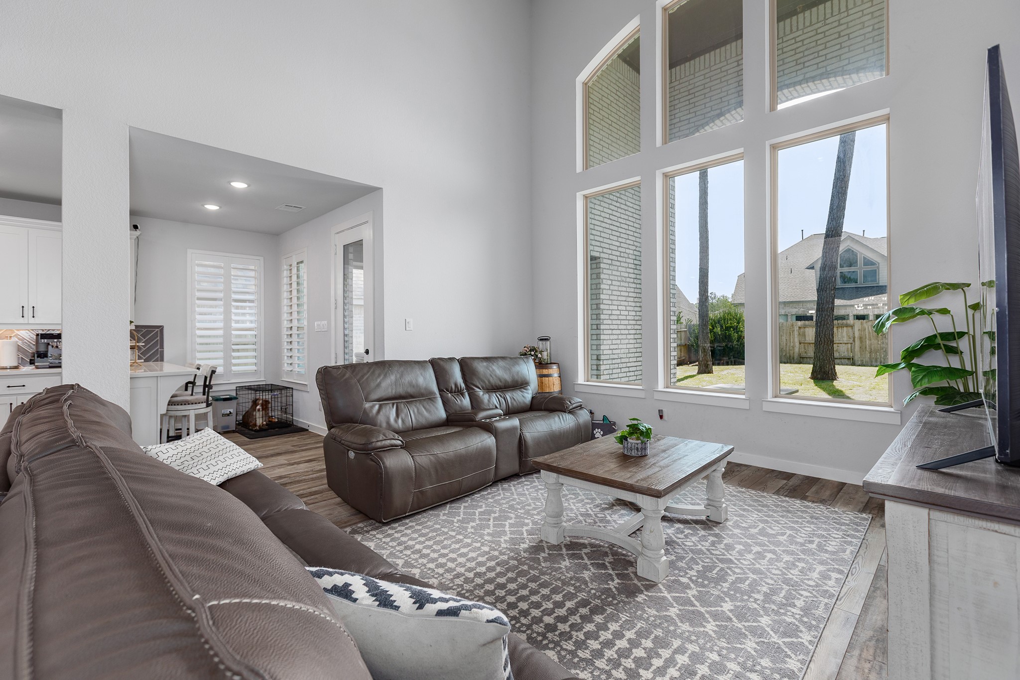 12110 Woodnote Lane Humble, TX 77346 - Photo 15 of 36 a living room with furniture and a large window