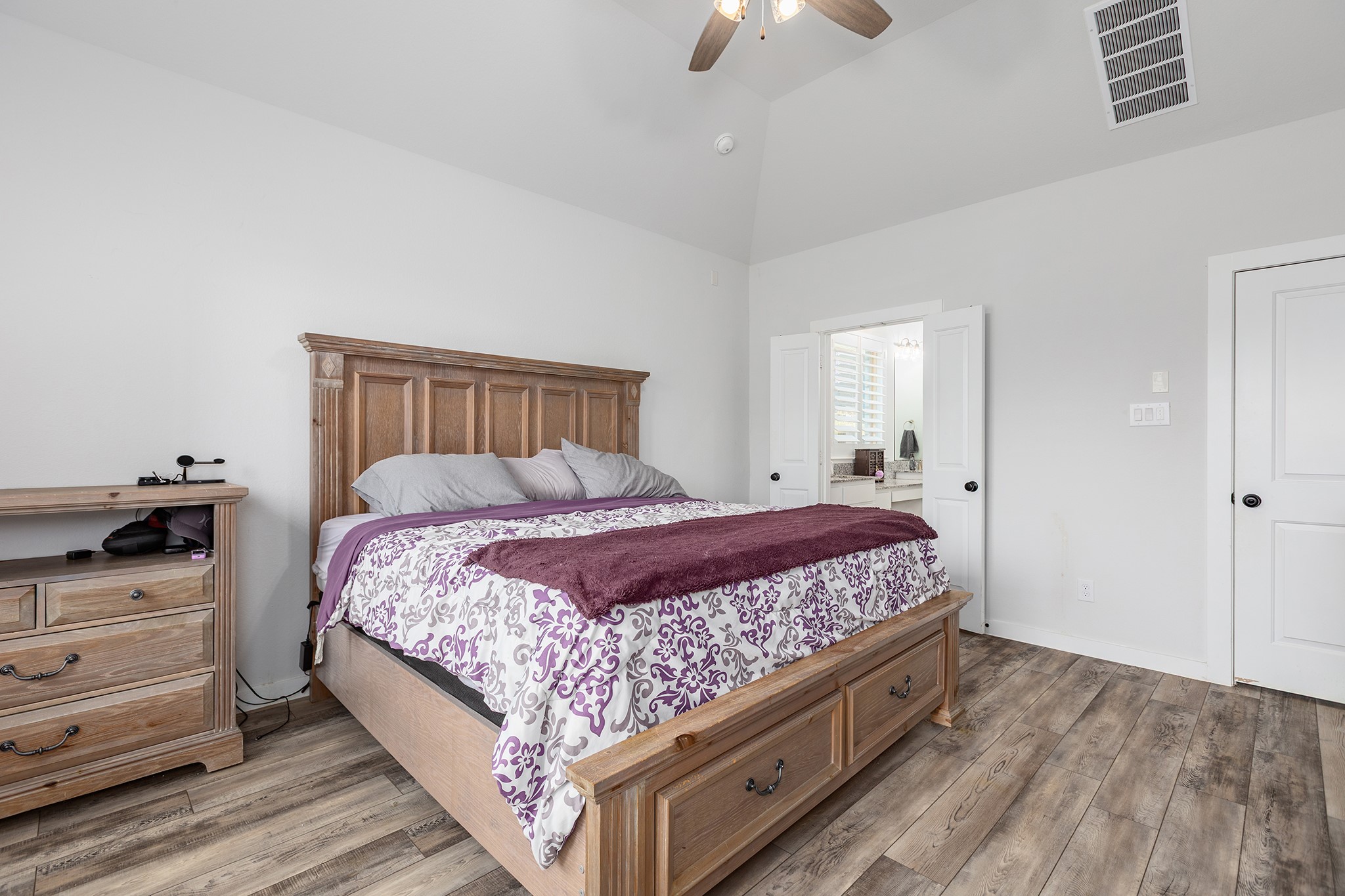 12110 Woodnote Lane Humble, TX 77346 - Photo 19 of 36 a bed room with a bed and dresser