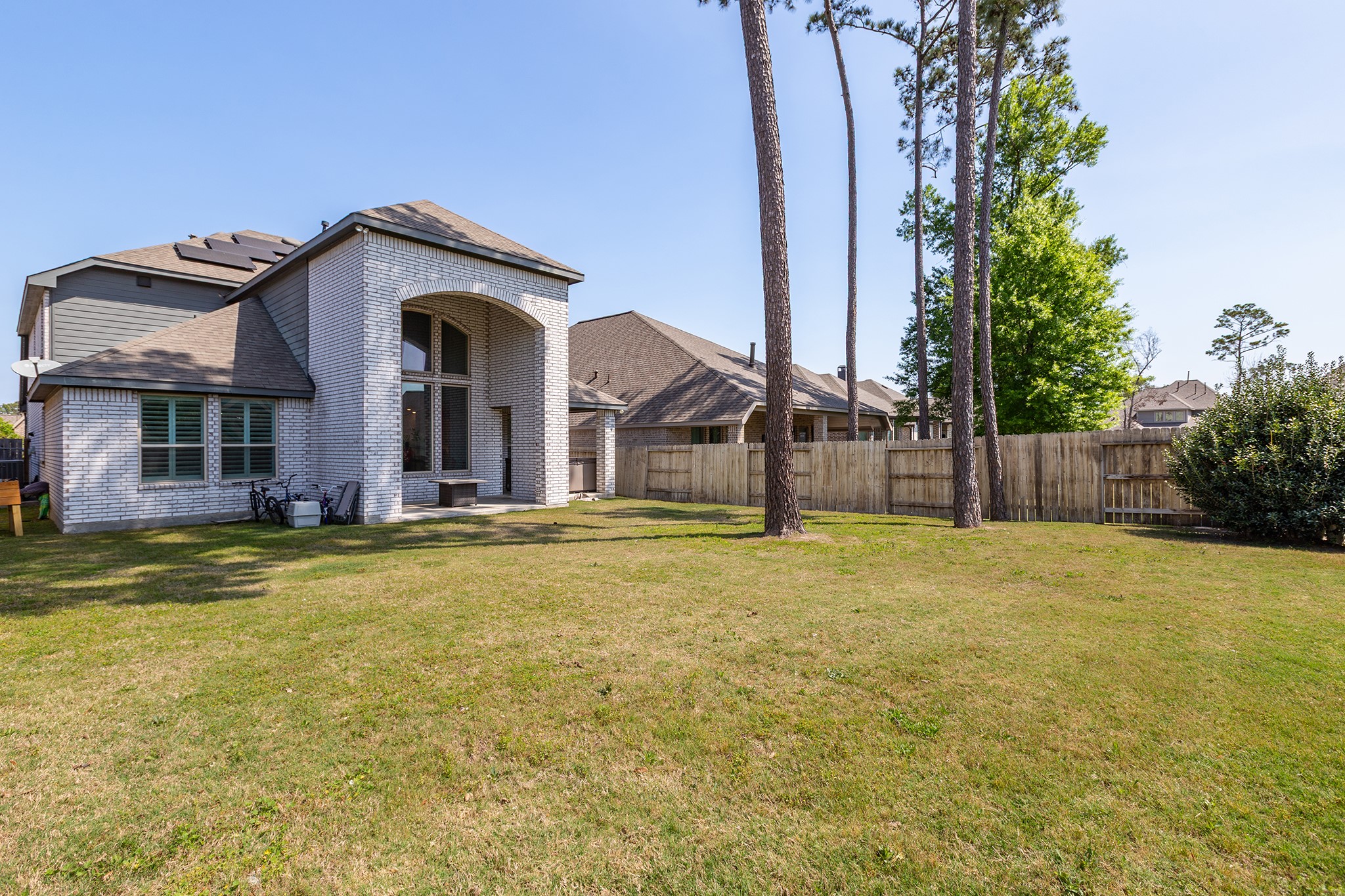 12110 Woodnote Lane Humble, TX 77346 - Photo 31 of 36 a house view with swimming pool in front of it