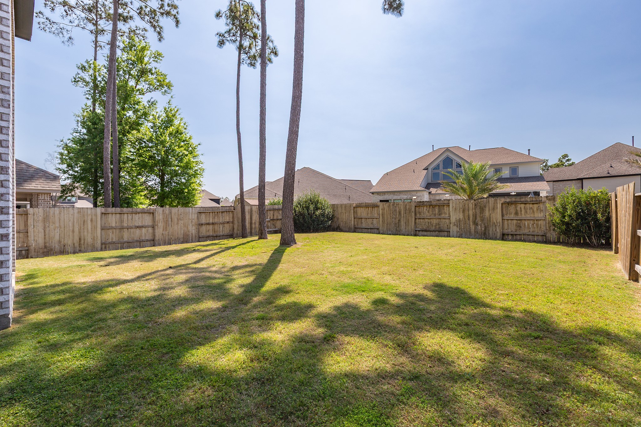 12110 Woodnote Lane Humble, TX 77346 - Photo 32 of 36 a view of a house with a swimming pool