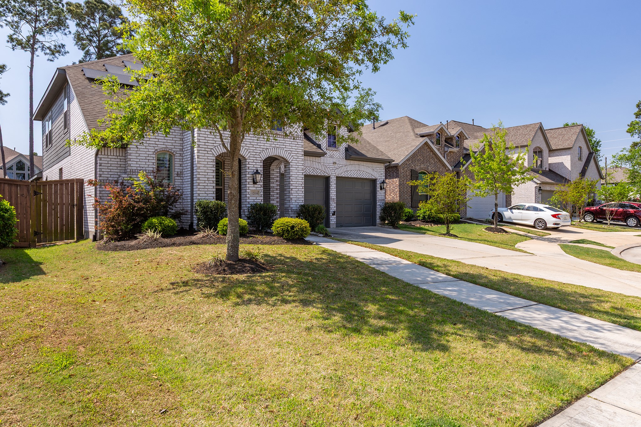 12110 Woodnote Lane Humble, TX 77346 - Photo 35 of 36 a view of a house with a swimming pool
