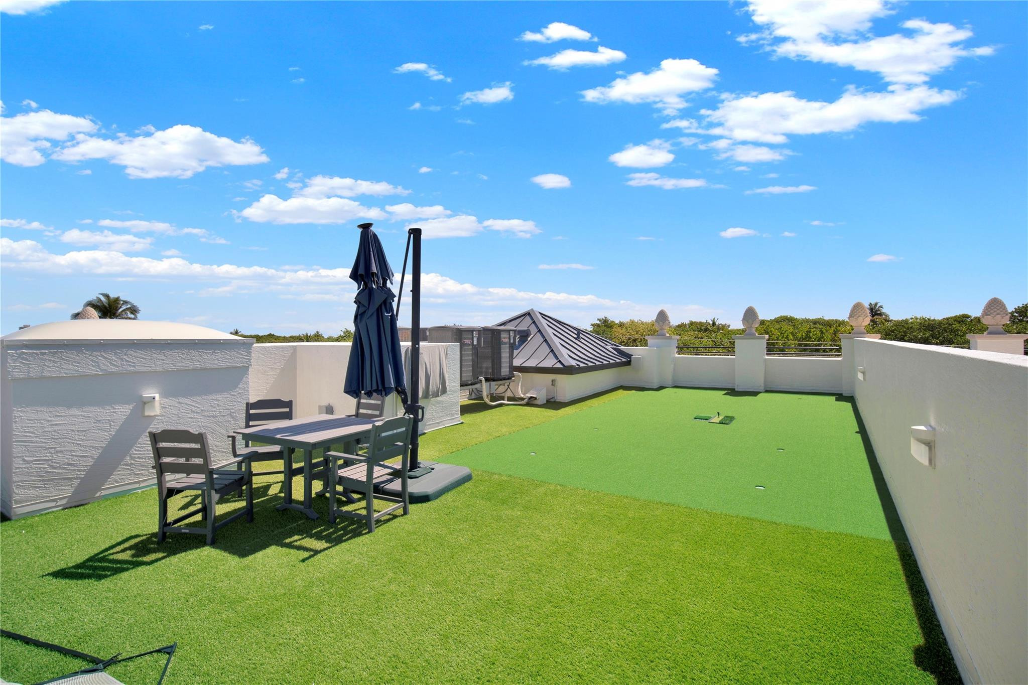 425 North Ocean Boulevard, Unit 3 Boca Raton, FL 33432 - Photo 59 of 69 a view of a golf course with chairs