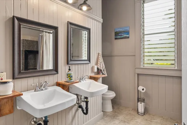 a bathroom with a sink and a toilet