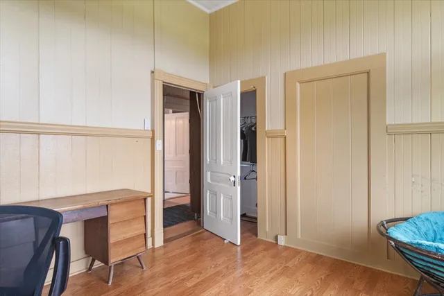 a view of a livingroom with furniture and wooden floor