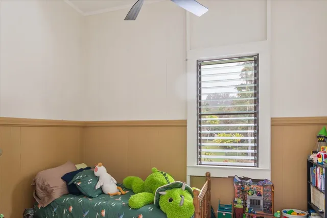 a bed room with furniture and a window