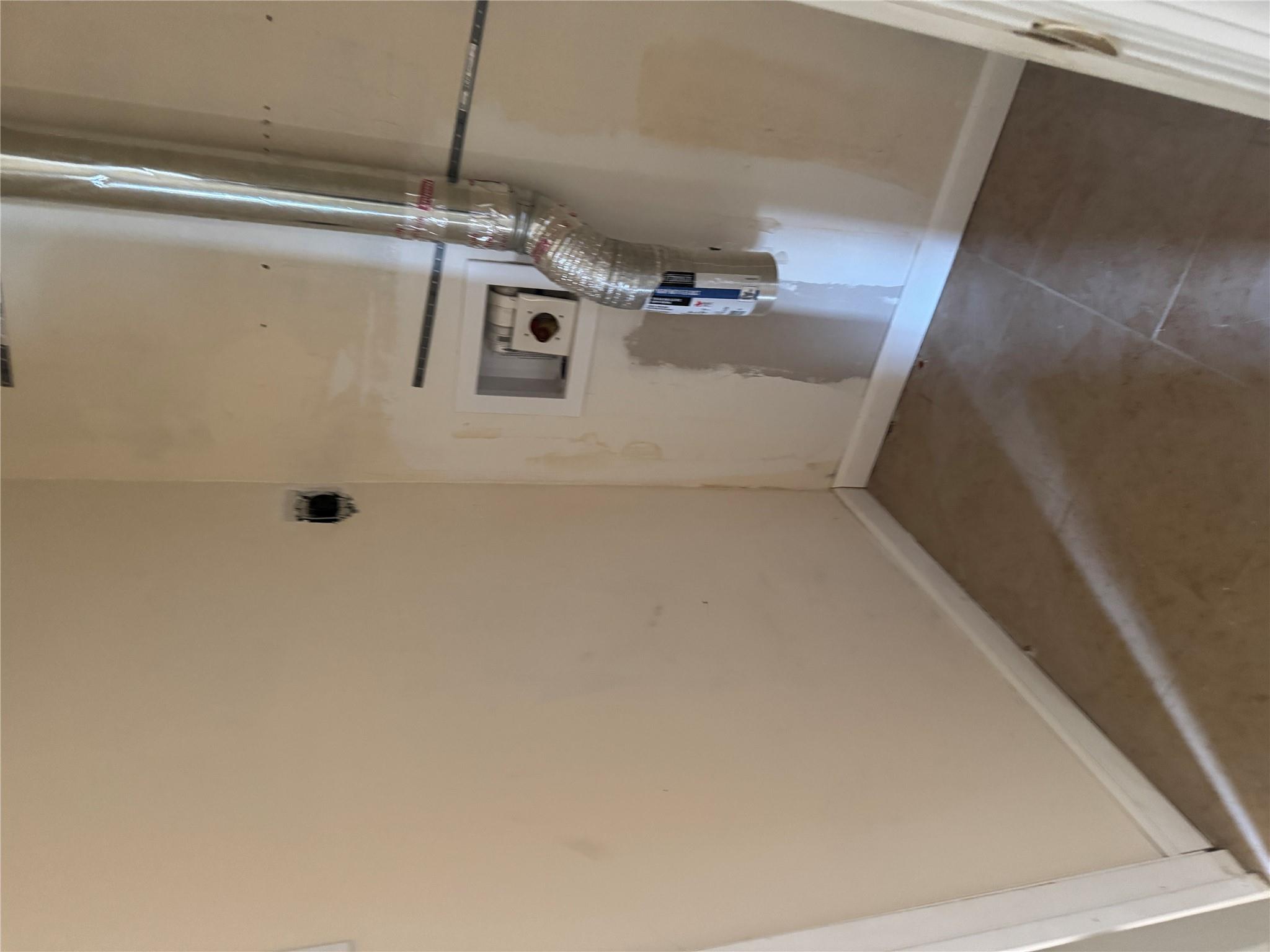 1 Pine Road Middle Island, NY 11953 - Photo 11 of 21 Laundry area with laundry area, electric dryer hookup, baseboards, and hookup for a washing machine