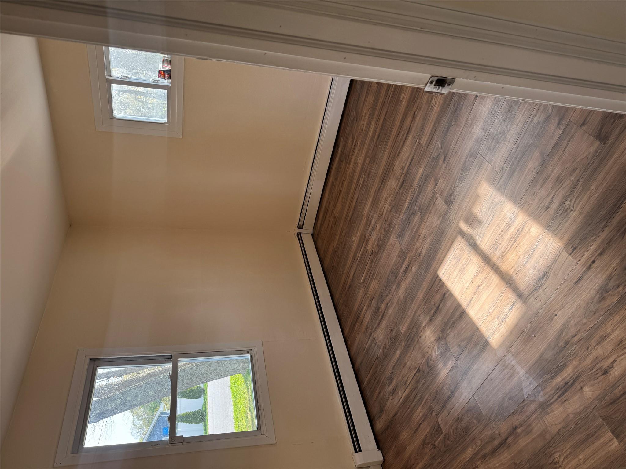1 Pine Road Middle Island, NY 11953 - Photo 8 of 21 Empty room with wood finished floors