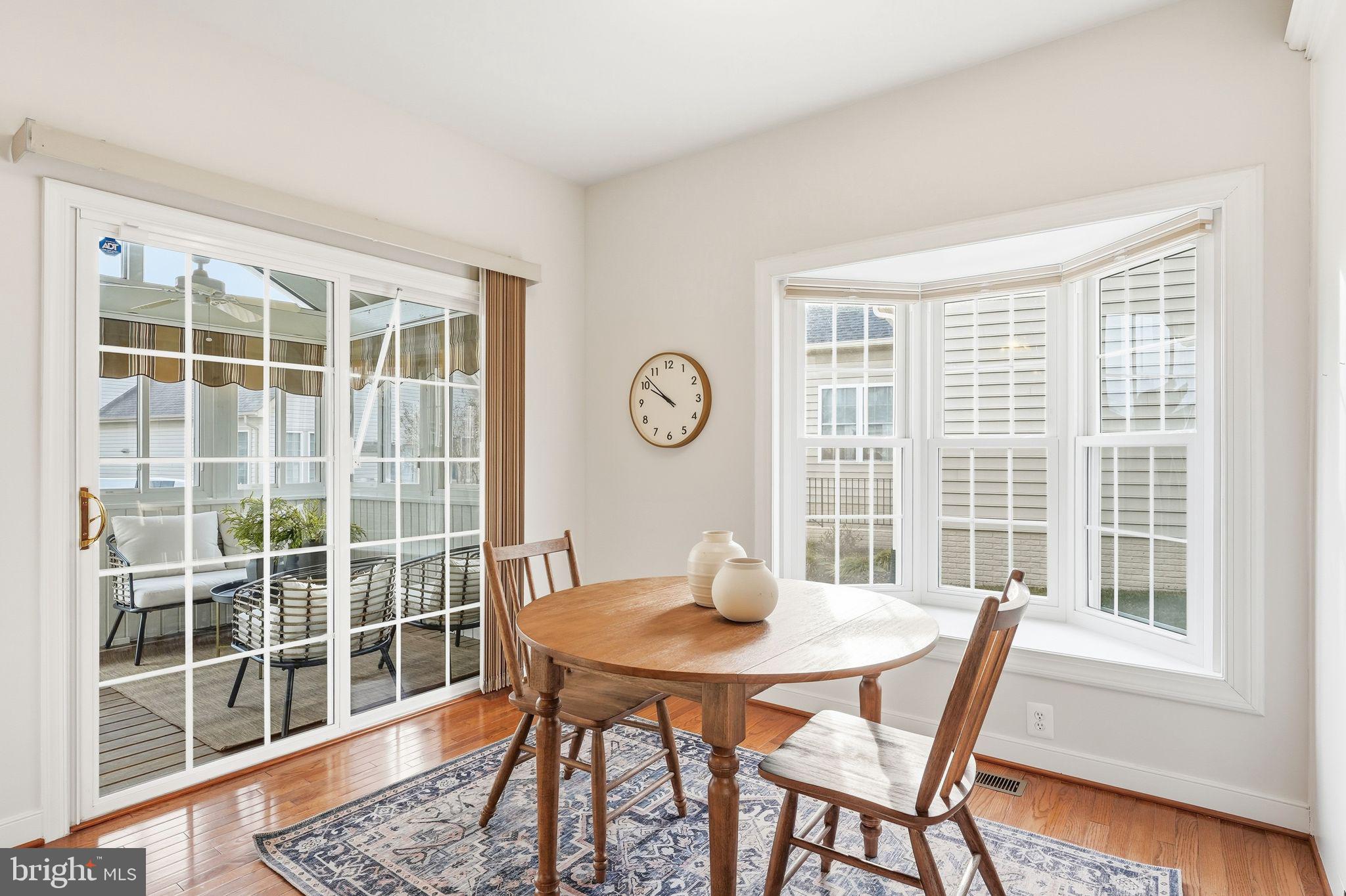 13141 Triple Crown Loop Gainesville, VA 20155 - Photo 24 of 68 a view of a dining room with furniture window and outside view