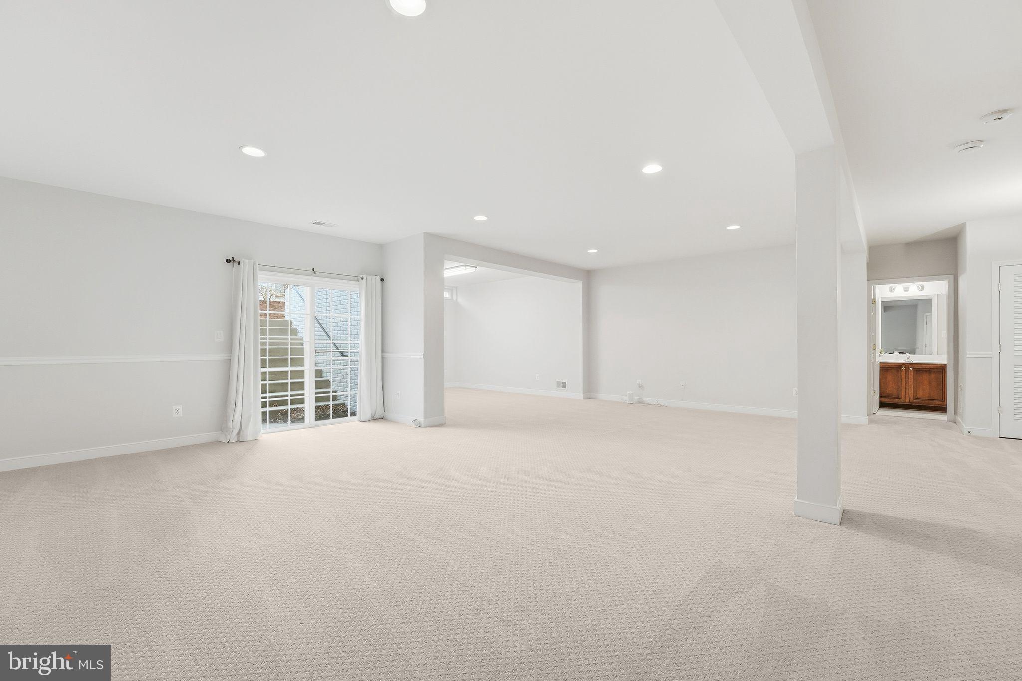 13141 Triple Crown Loop Gainesville, VA 20155 - Photo 43 of 68 a view of an empty room with a window