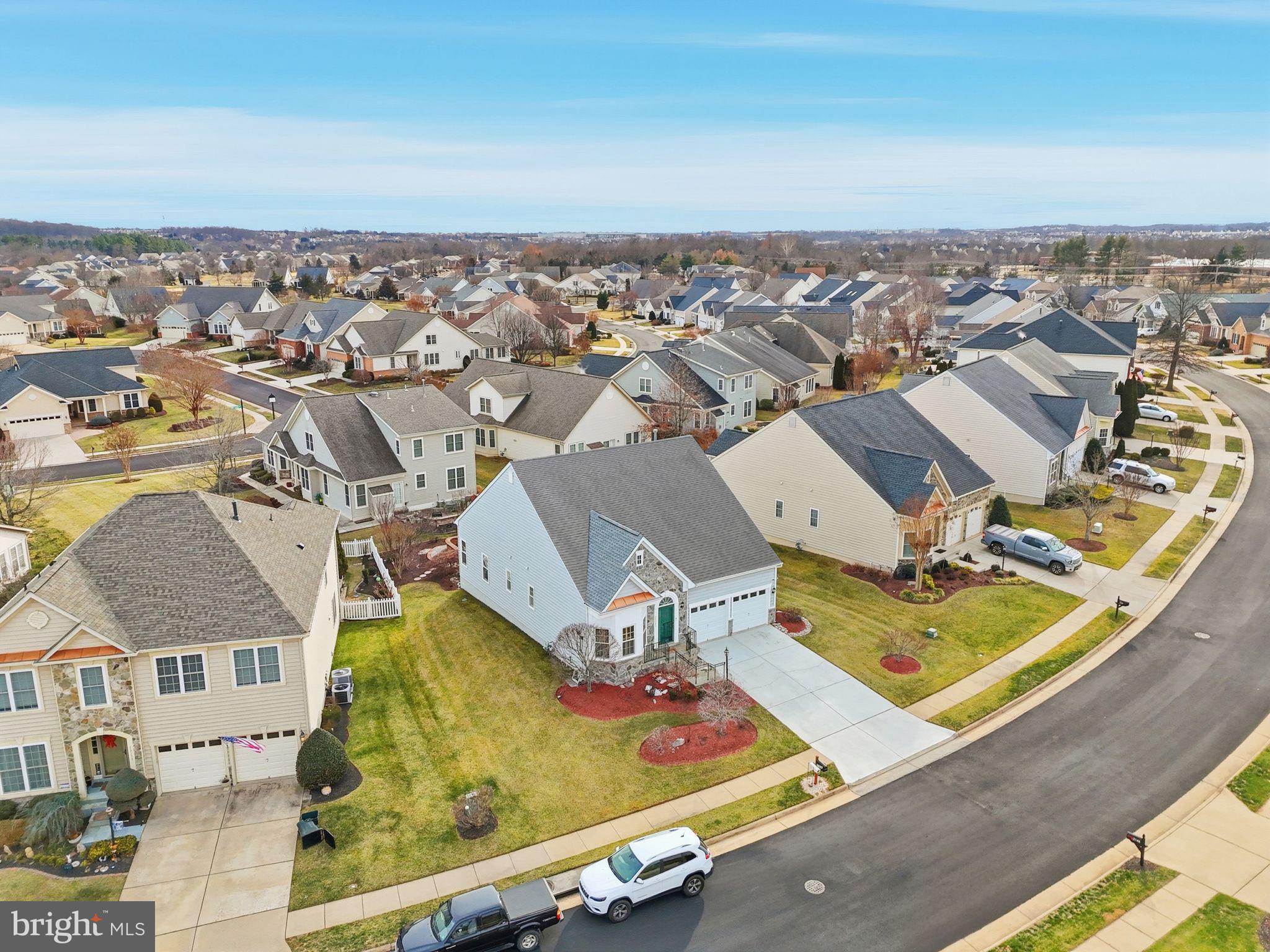 13141 Triple Crown Loop Gainesville, VA 20155 - Photo 61 of 68 an aerial view of residential houses with outdoor space