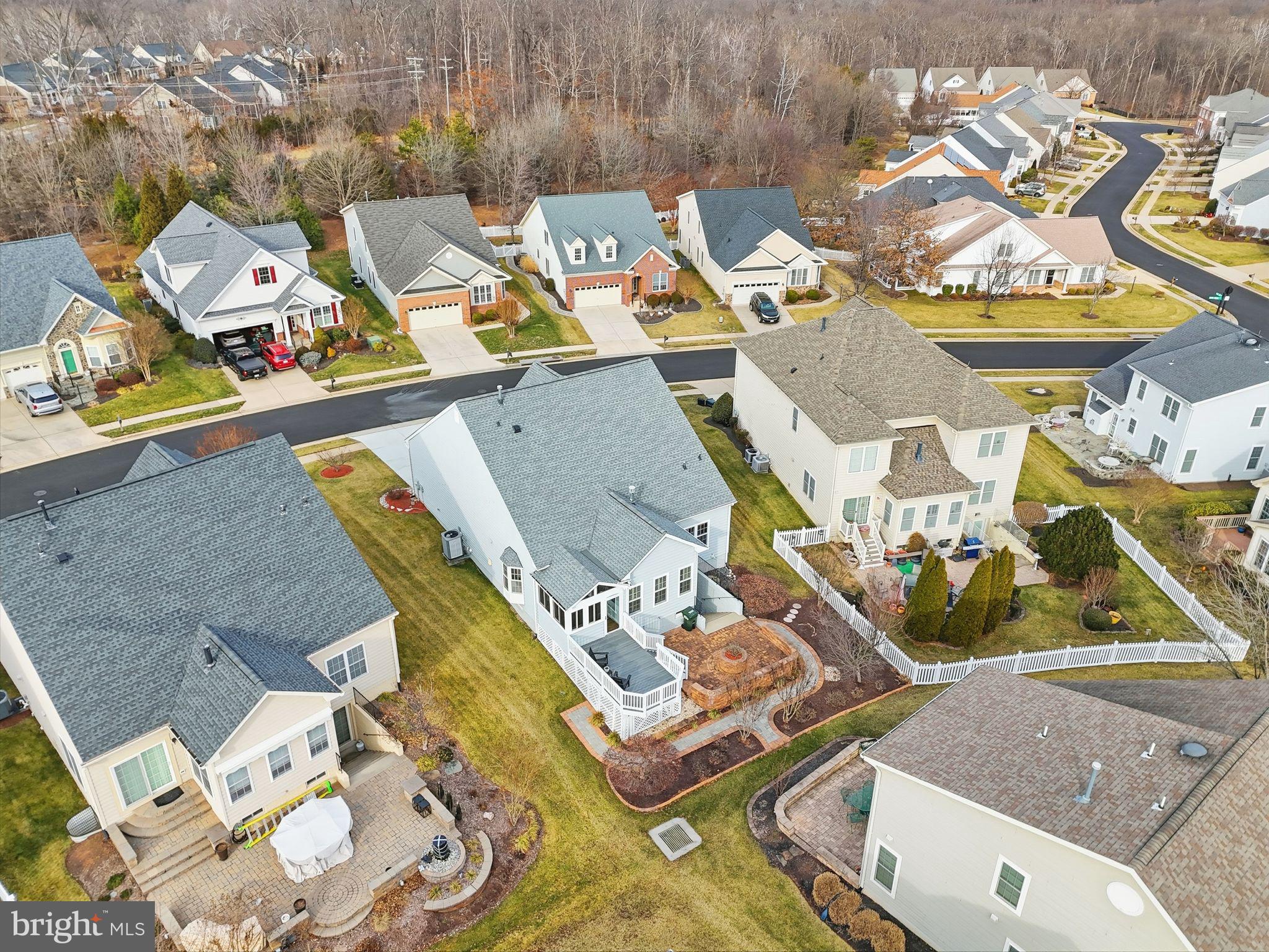 13141 Triple Crown Loop Gainesville, VA 20155 - Photo 62 of 68 an aerial view of a house with swimming pool