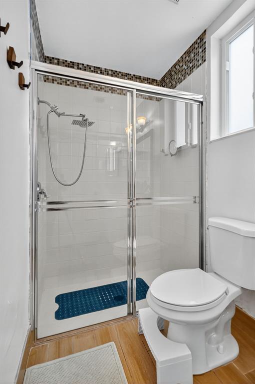 18676 Southwest 16th Street Pembroke Pines, FL 33029 - Photo 24 of 61 a bathroom with a toilet and a shower