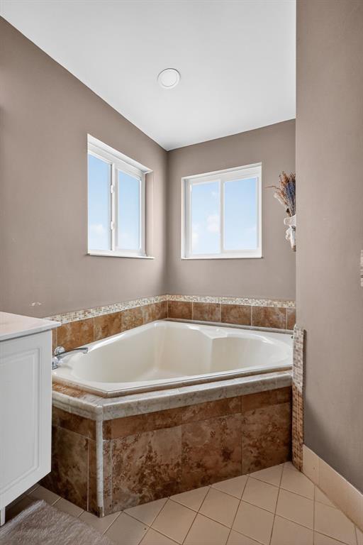 18676 Southwest 16th Street Pembroke Pines, FL 33029 - Photo 43 of 61 a bath tub sitting in a bathroom next to a window