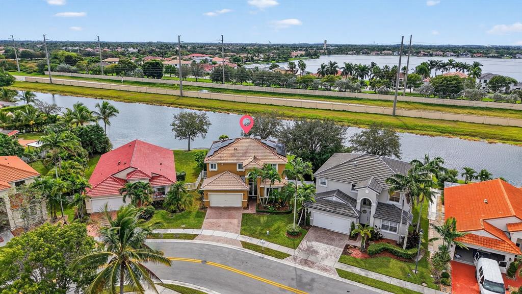 18676 Southwest 16th Street Pembroke Pines, FL 33029 - Photo 53 of 61 an aerial view of a house with a swimming pool yard and outdoor seating