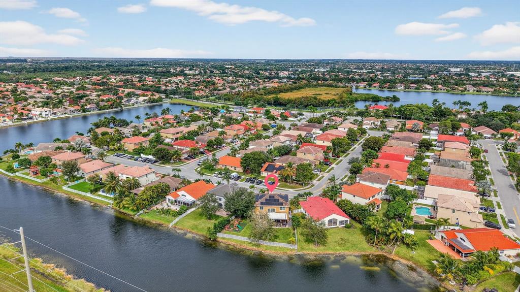 18676 Southwest 16th Street Pembroke Pines, FL 33029 - Photo 59 of 61 an aerial view of residential houses with outdoor space