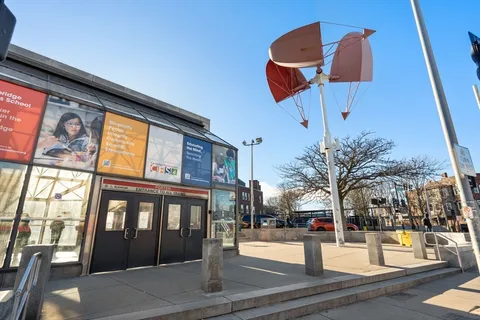 a view of a building with a street