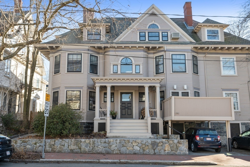 192 Upland Road Cambridge, MA 02140 - Photo 29 of 29 a view of a big building with many windows