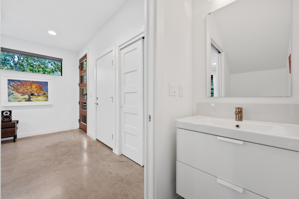 1005 Cardinal Lane, Unit B Austin, TX 78704 - Photo 12 of 17 a view of a hallway to rooms