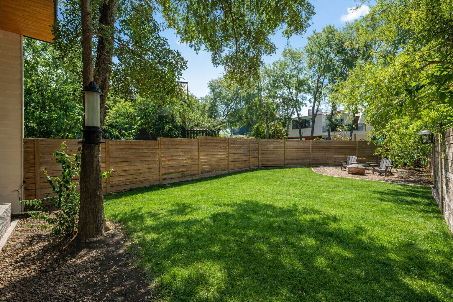 1005 Cardinal Lane, Unit B Austin, TX 78704 - Photo 15 of 17 a view of yard and tree