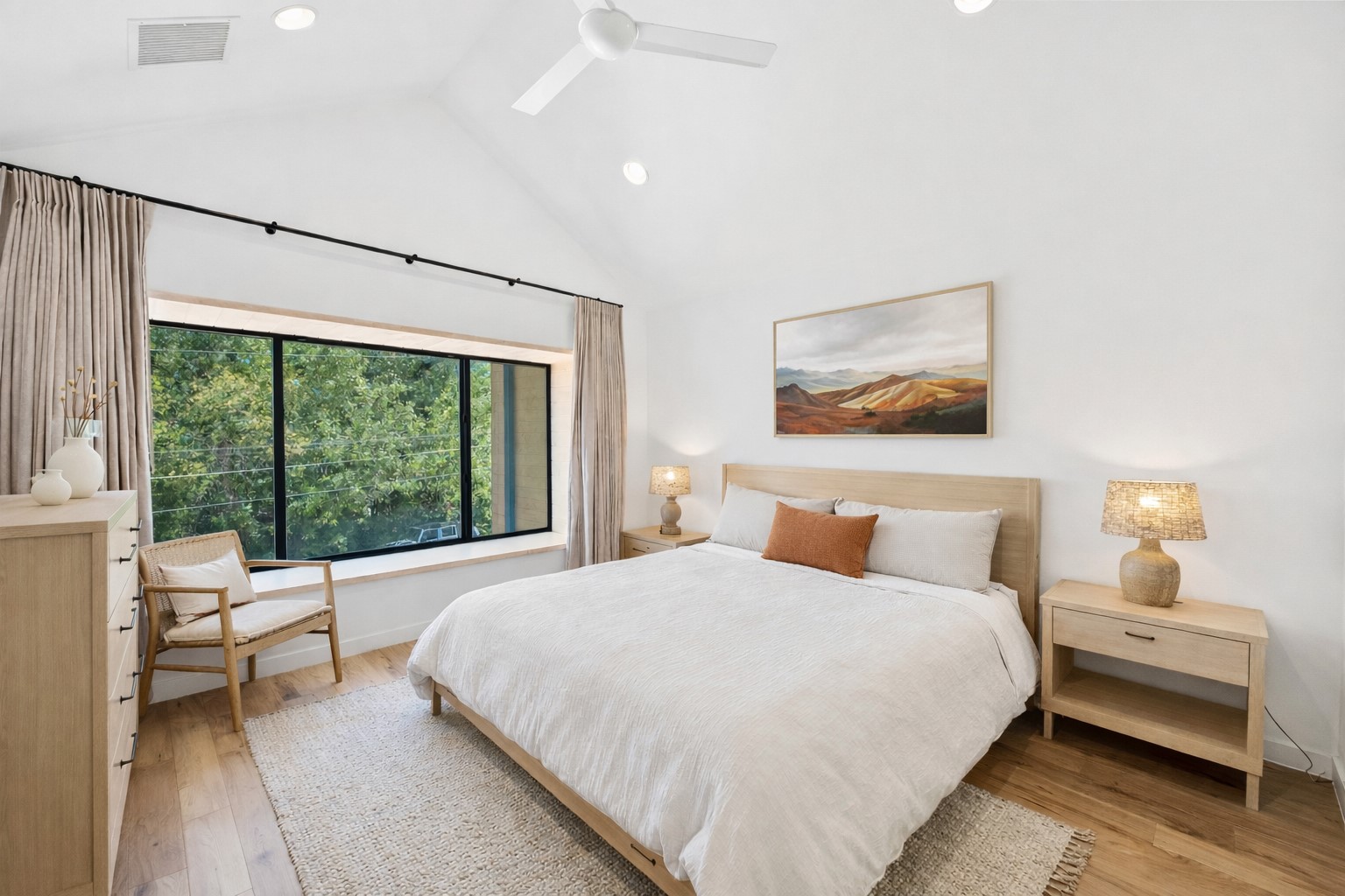 1005 Cardinal Lane, Unit B Austin, TX 78704 - Photo 6 of 17 a bedroom with a bed and a large window