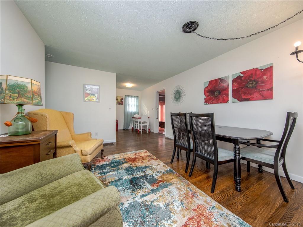 190 Brickyard Road Etowah, NC 28729 - Photo 3 of 15 a living room with furniture and a rug