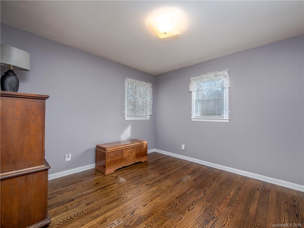 190 Brickyard Road Etowah, NC 28729 - Photo 7 of 15 a view of room with window and wooden floor
