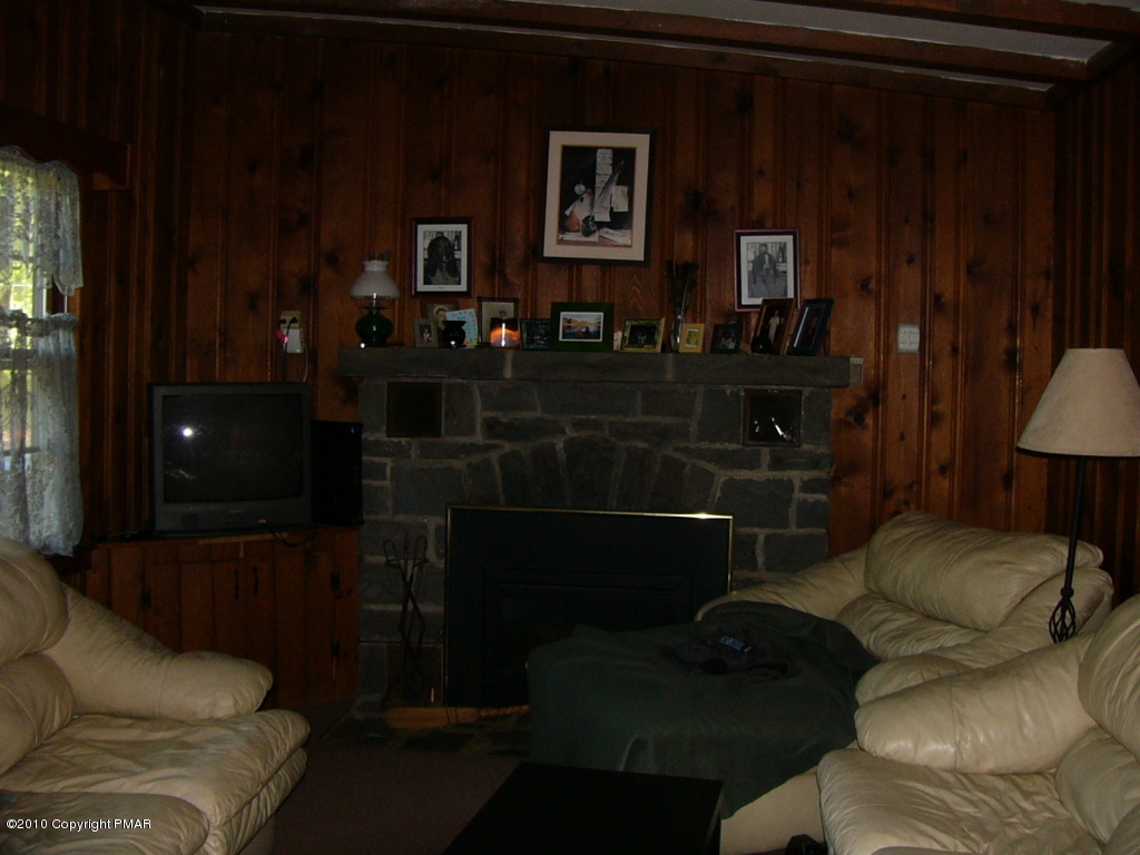 Lake Road Canadensis, PA 18325 - Photo 7 of 10 a living room with furniture and a lamp