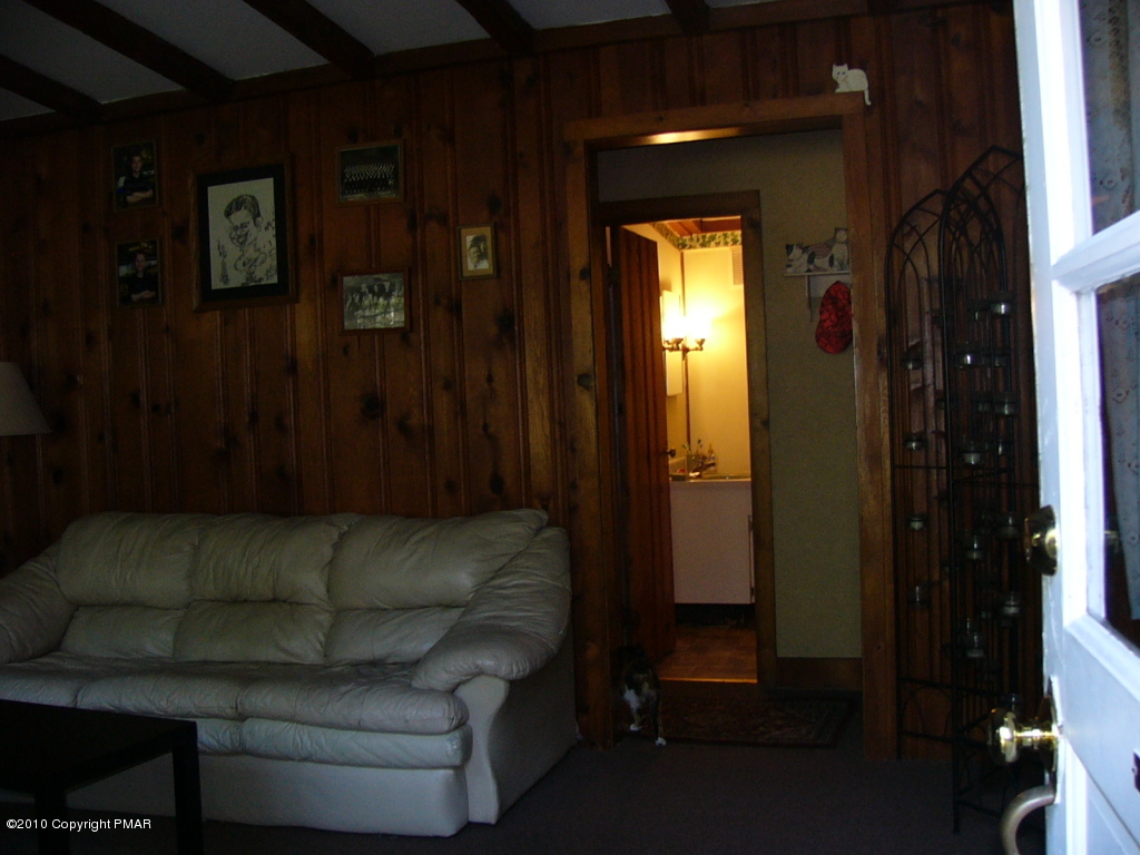 Lake Road Canadensis, PA 18325 - Photo 8 of 10 a living room with furniture and a entryway