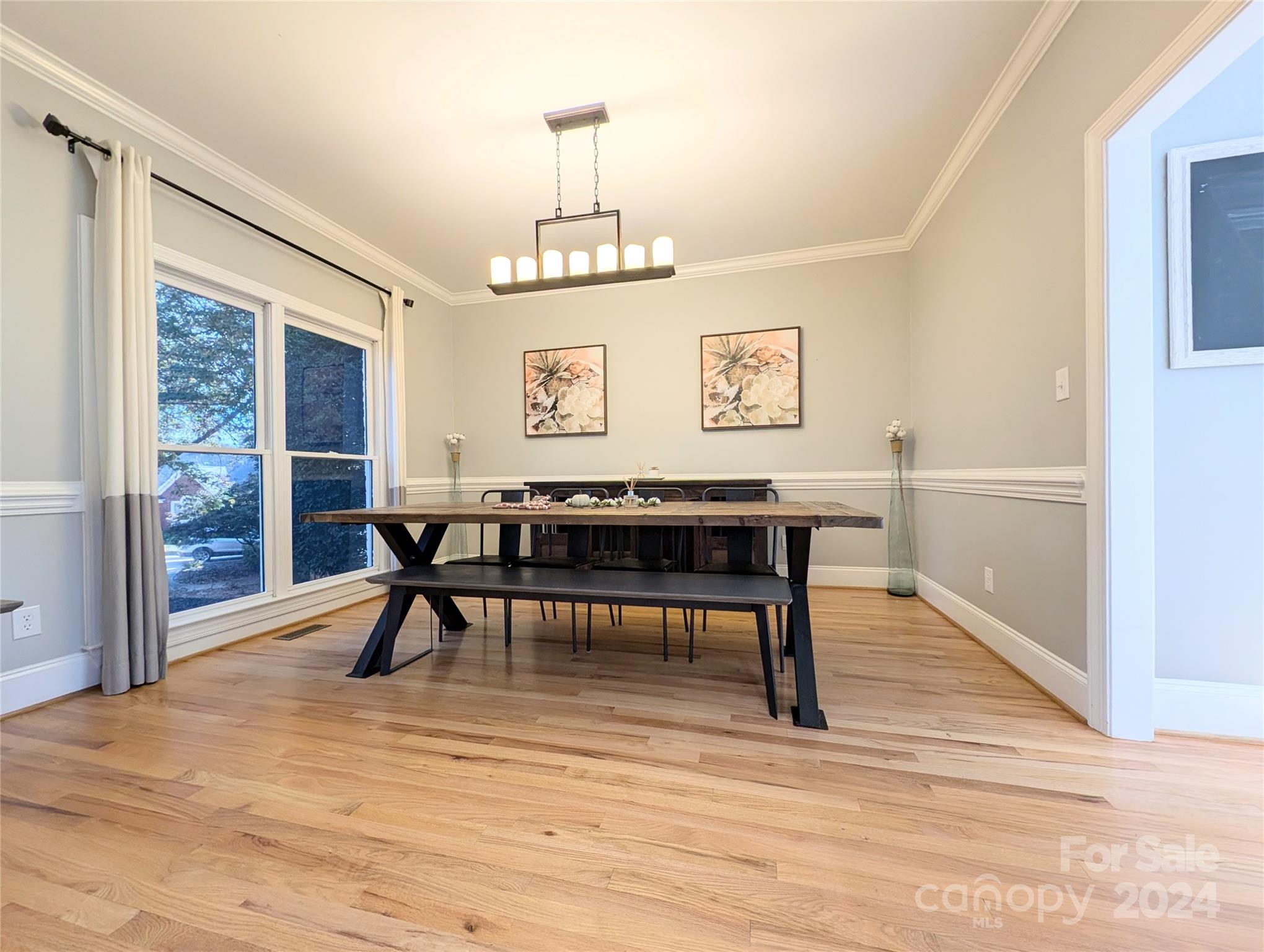 640 Amberly Crossing Fort Mill, SC 29708 - Photo 12 of 45 a view of a dining room with furniture window and wooden floor