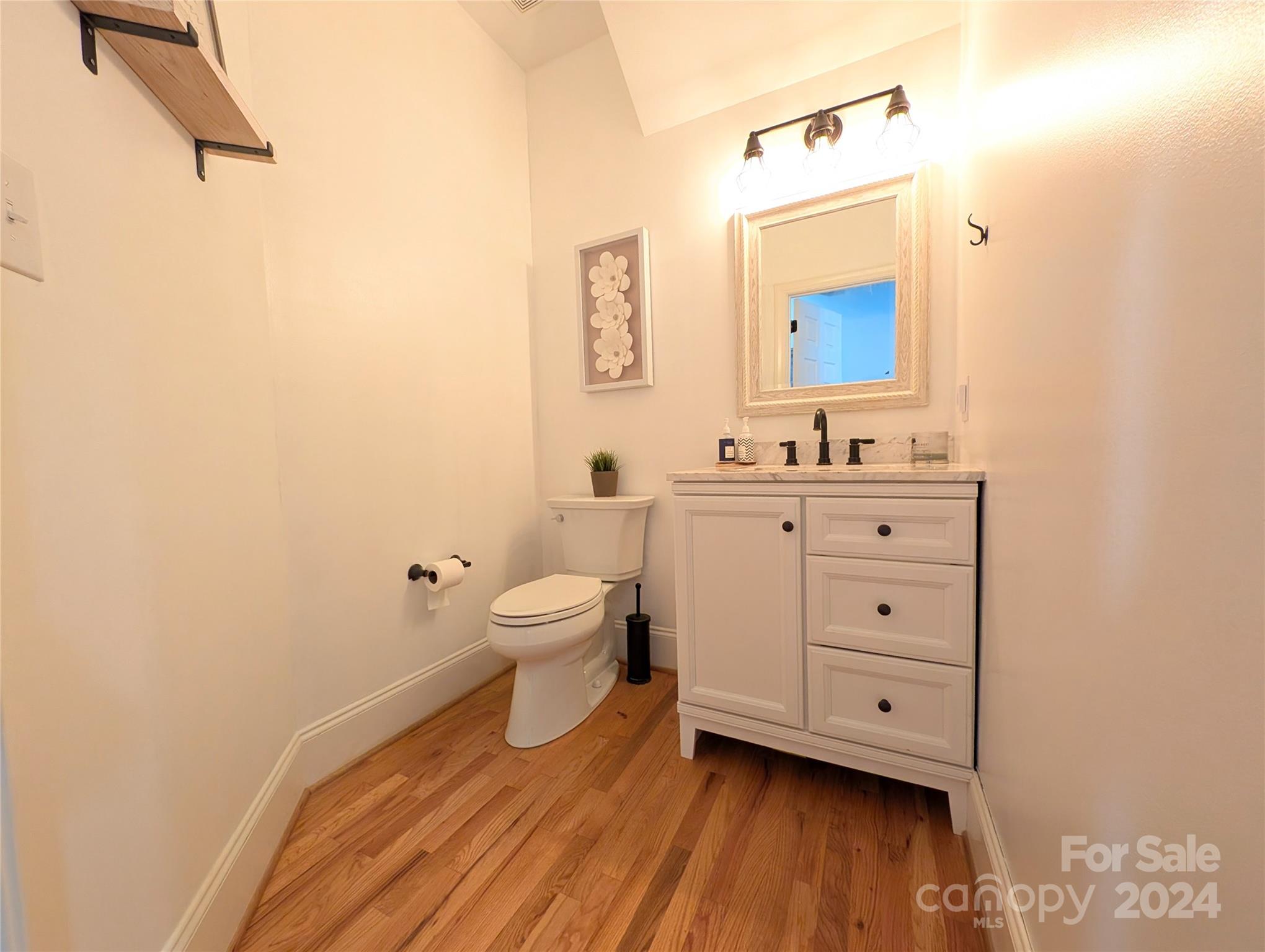 640 Amberly Crossing Fort Mill, SC 29708 - Photo 23 of 45 a bathroom with a toilet sink and mirror