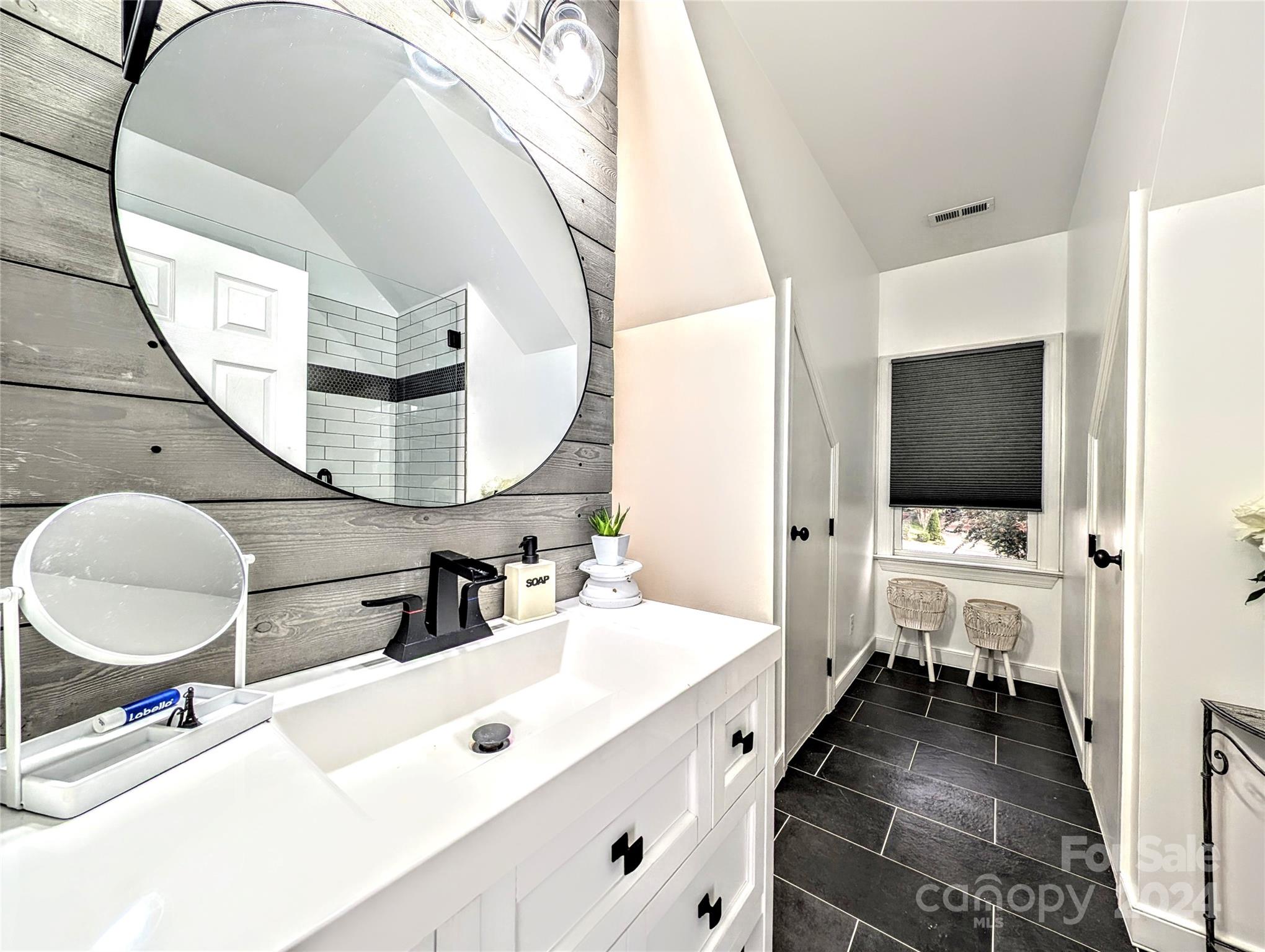 640 Amberly Crossing Fort Mill, SC 29708 - Photo 25 of 45 a en suite bathroom with a large tub and mirror