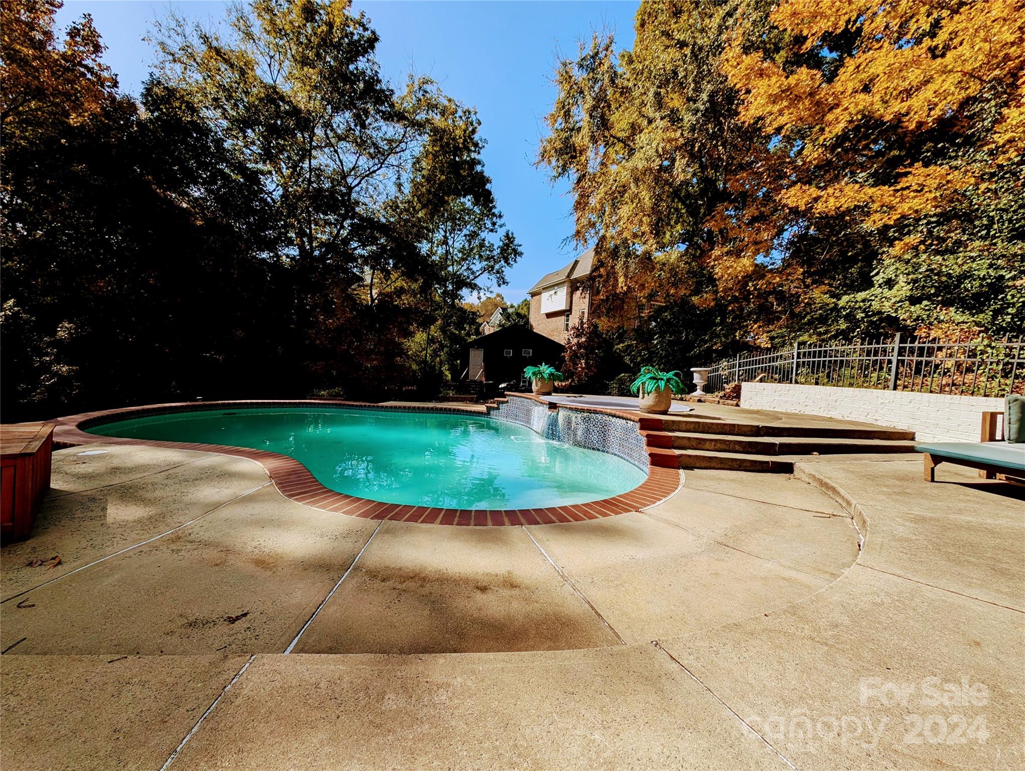 640 Amberly Crossing Fort Mill, SC 29708 - Photo 40 of 45 a view of a swimming pool with a yard