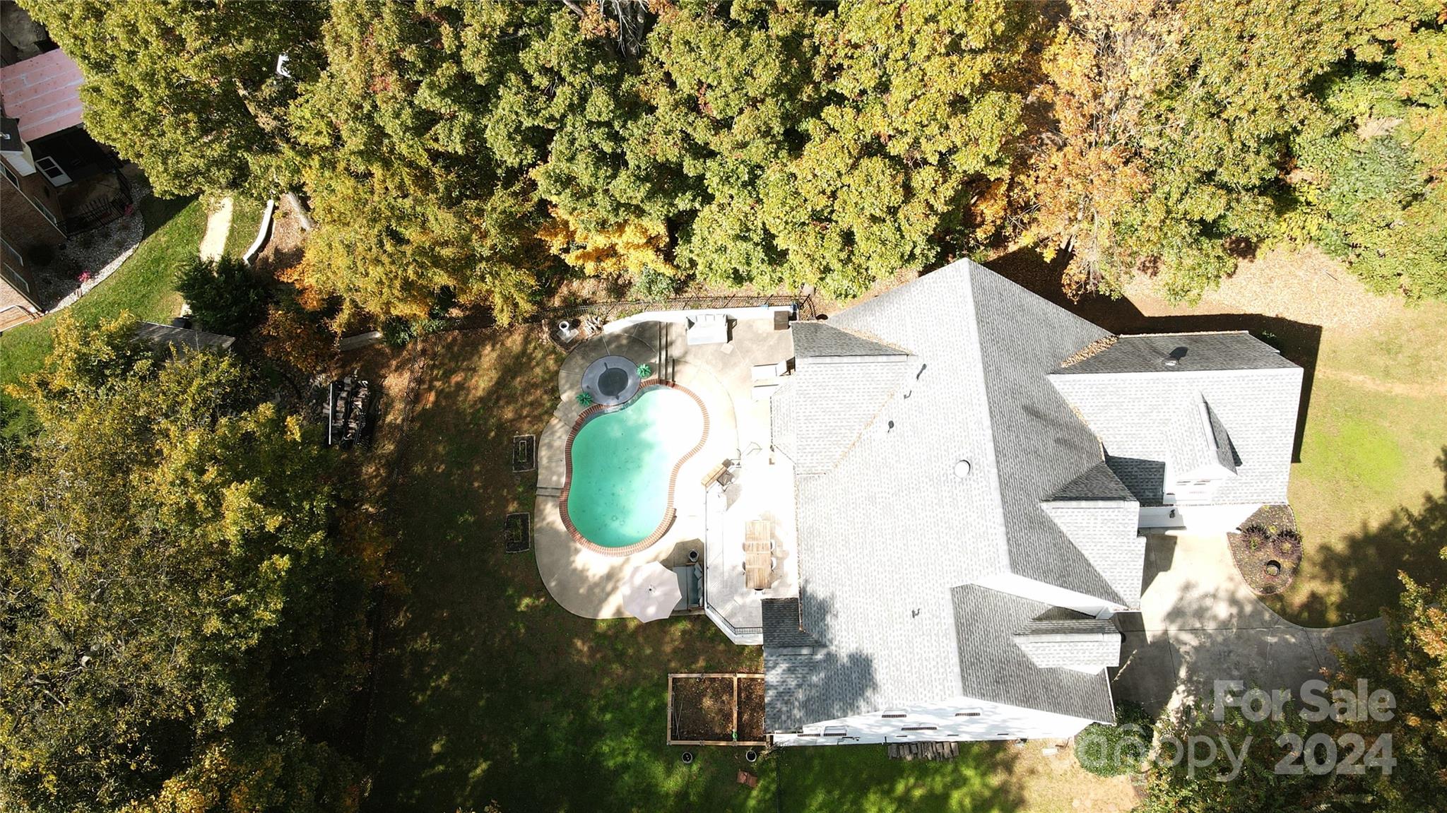 640 Amberly Crossing Fort Mill, SC 29708 - Photo 43 of 45 an aerial view of a house with swimming pool and large trees